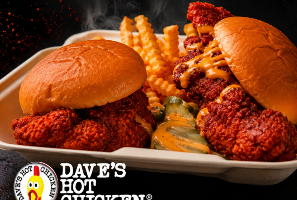 Dave's Hot Chicken branded ad with steaming hot chicken sandwiches