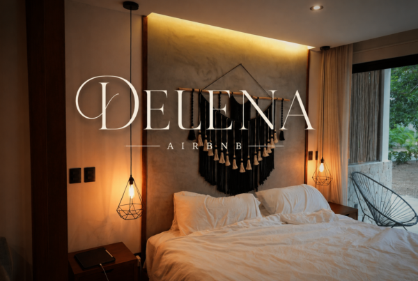 Delena Airbnb luxury bedroom with warm lighting and macrame wall art